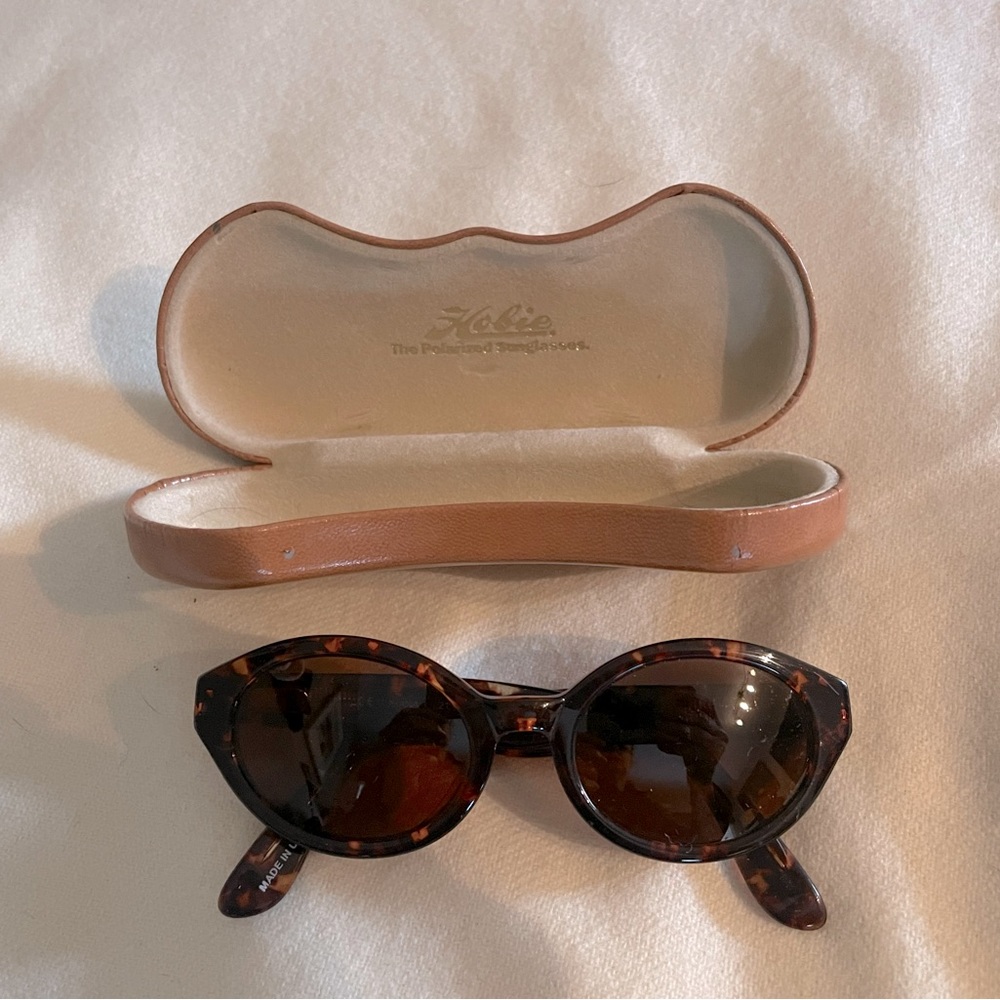 Vintage Hobie polarized sunglasses with leather case. Oval shape